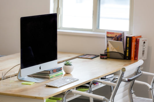How to fit three monitors on an office desk