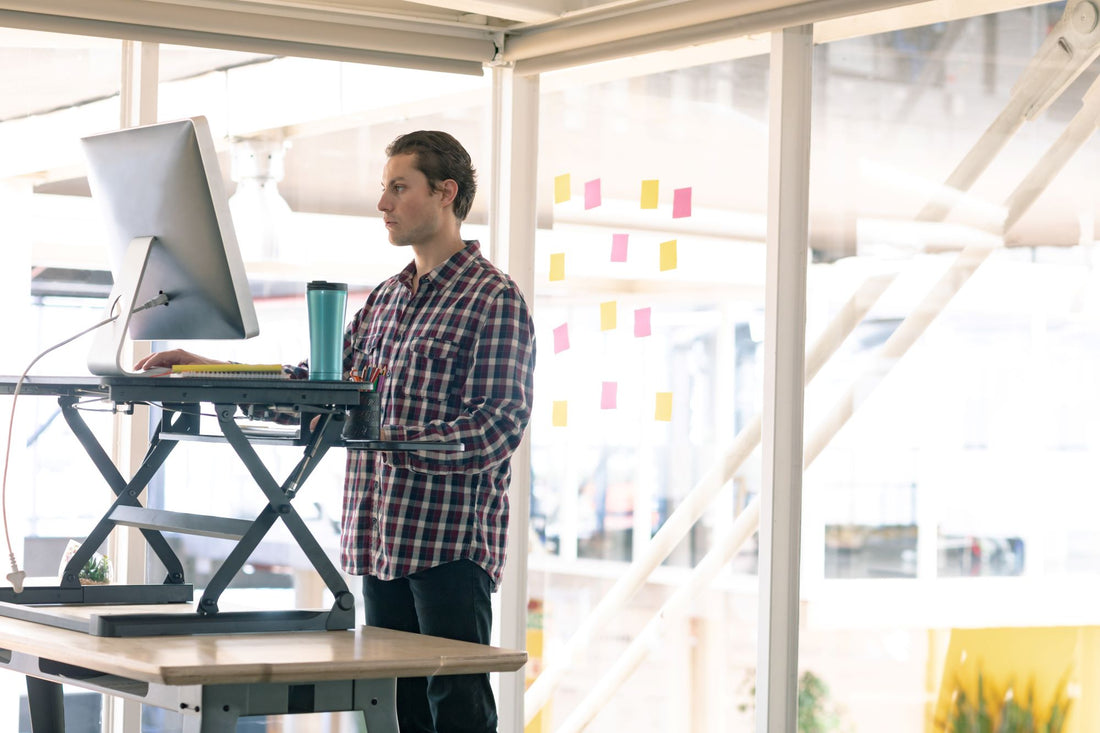 How long should you stand at your desk?