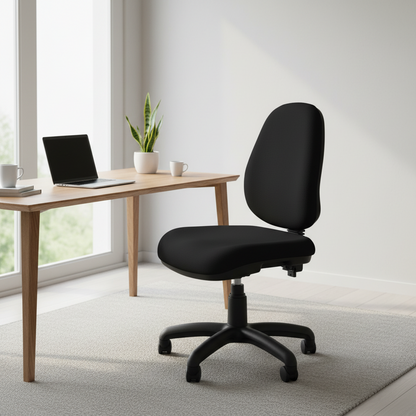 A black office chair with a high back and wheeled base, placed in a bright home office next to a light wood desk with a laptop, plant, and cups.